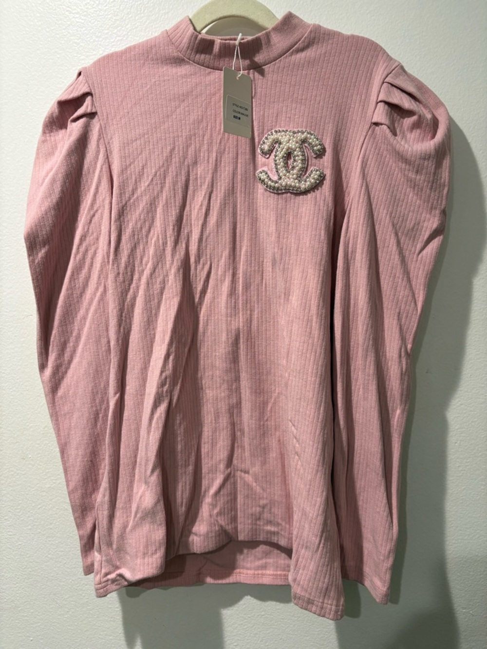 Pink ribbed turtleneck with Pearl embroidery